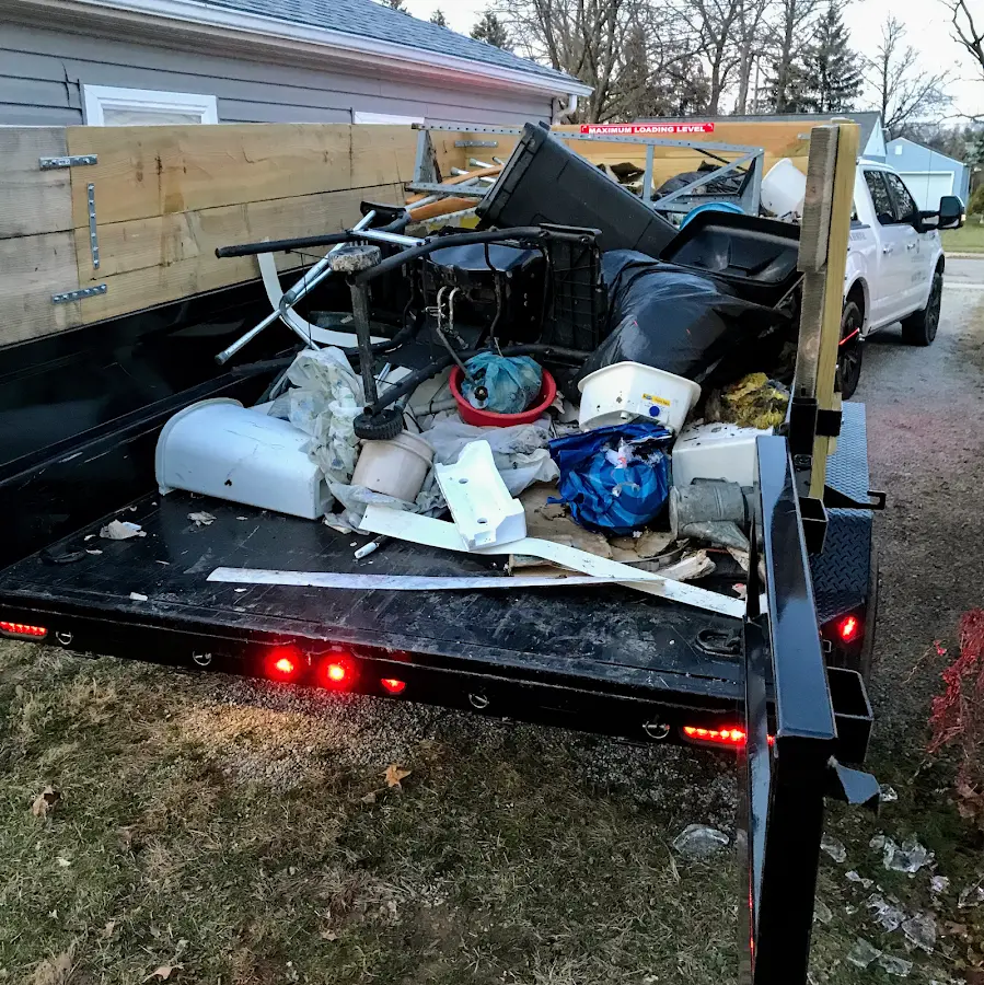 Roll-off dumpster delivered to a residential driveway in Seven Corners
