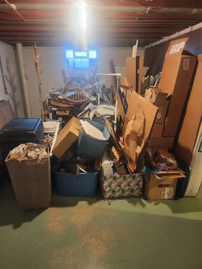 Roll-off dumpster container at job site for Cleanout Dumpster Rental in Seven Corners